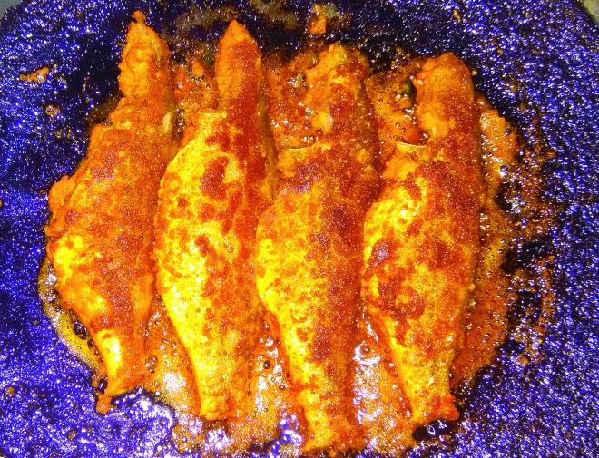 Cook, Eat and Drink - A picture of four fried fish